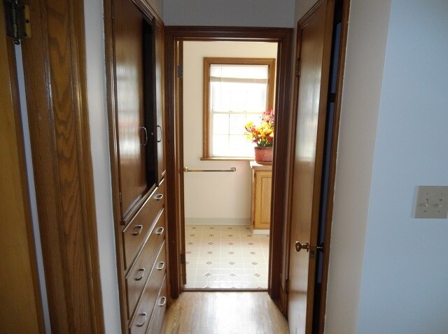 Upstairs hallway has linen closet and large clothes closet outside full hall bath. - 742 E Ford Ave