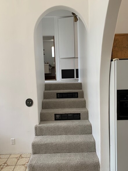 Stairway up to three bedrooms including master - 10458 Pearson Pl