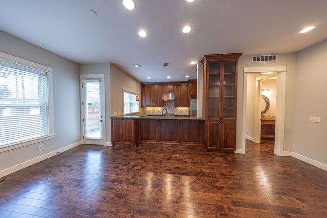 Building Photo - 2 Creeks Condominiums - Gated Community on...