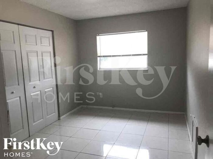 Building Photo - 8275 Jacaranda Ave