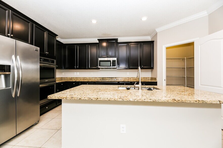Building Photo - 16171 Magnolia Grove Way
