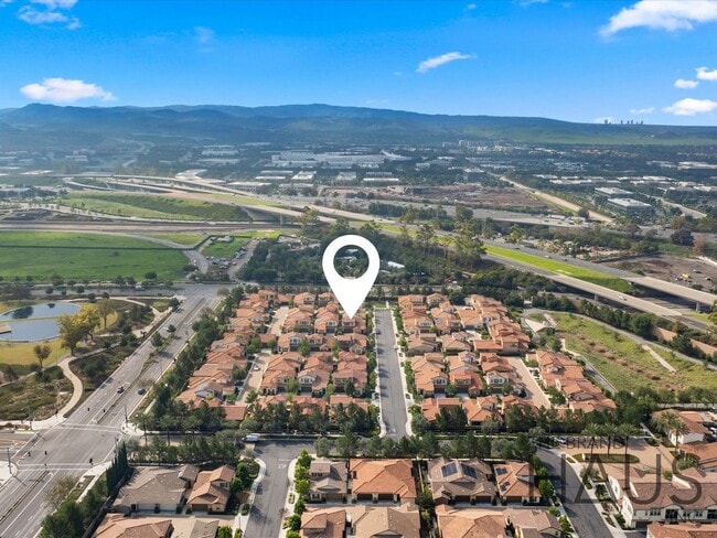 Building Photo - Rare 55+ Gated Travata Community – Bedrooms on Main + Loft + Resort-Style Amenities!