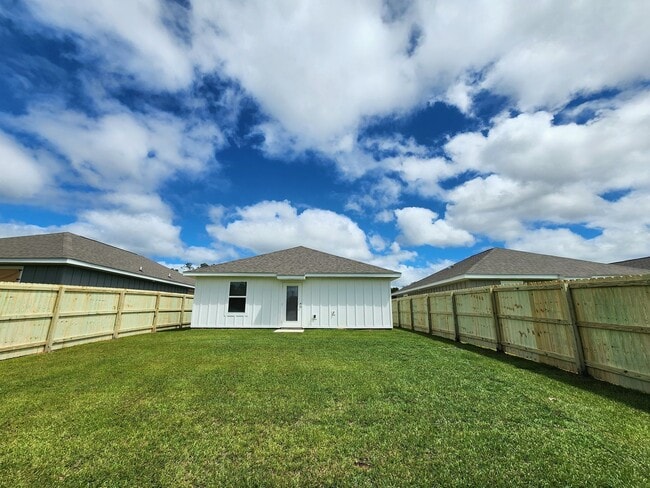 Building Photo - New 3/2 with fenced yard in Foley