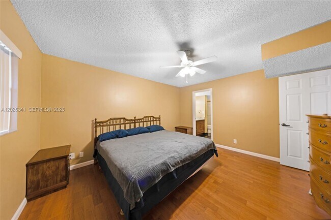 Building Photo - 6075 N Sabal Palm Blvd