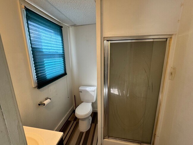 Building Photo - Second-Floor Studio - Weekly Rent