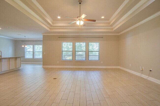 Building Photo - Spacious 4BR Pool Home with Modern Upgrade...