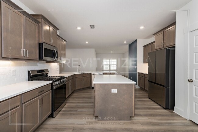 Building Photo - Charming Gold Fortified Home in Live Oak Estates – Near Downtown Fairhope!