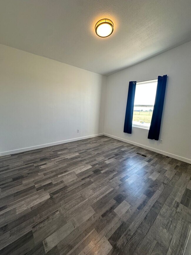 Building Photo - MODERN UPGRADES AND RURAL LIVING IN PEYTON