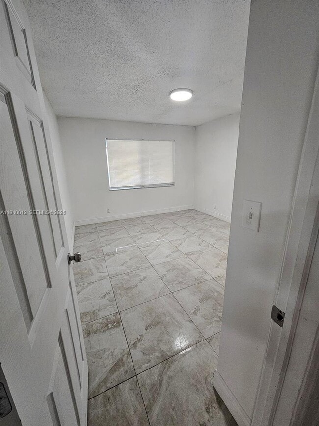 Building Photo - 5615 NW 27th Ct