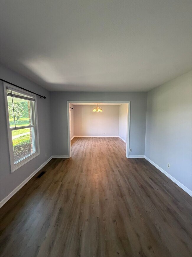 Building Photo - Situated in the heart of Sango, massive lot, and includes a fully finished & recently remodeled b...