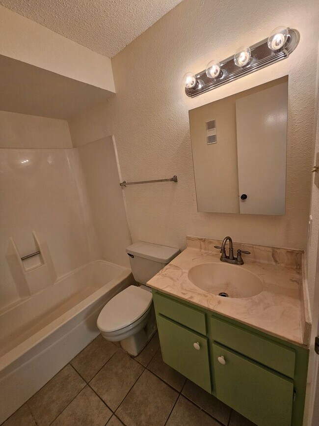 Building Photo - Beautifully Updated 2BR/2BA with Loft Oasis – Safe & Gated Community