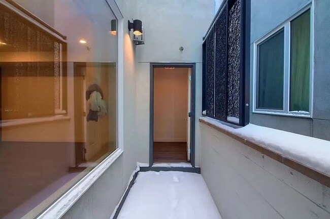 Building Photo - Modern LoHi Living with Rooftop Deck & City Views!!