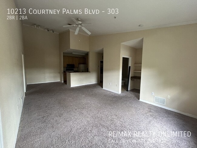 Building Photo - 10213 Courtney Palms Blvd