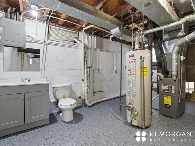 Building Photo - Stylish Updates + Spacious Yard + 2-Car Ga...