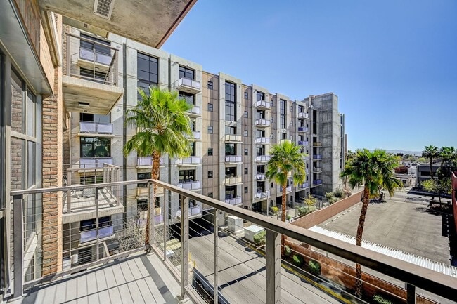 Building Photo - Fully Furnished 4th-Floor Condo with Stunning Downtown Views!