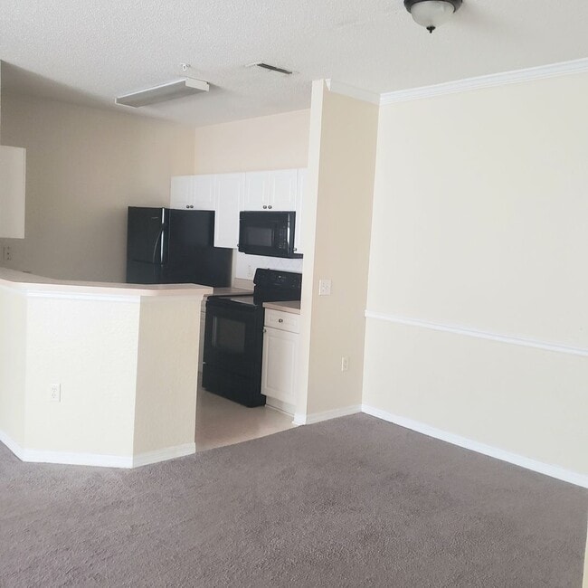 Building Photo - Very nice 2bed/1bath condo on 2nd floor in gated Enclave at Richmond place in New Tampa!