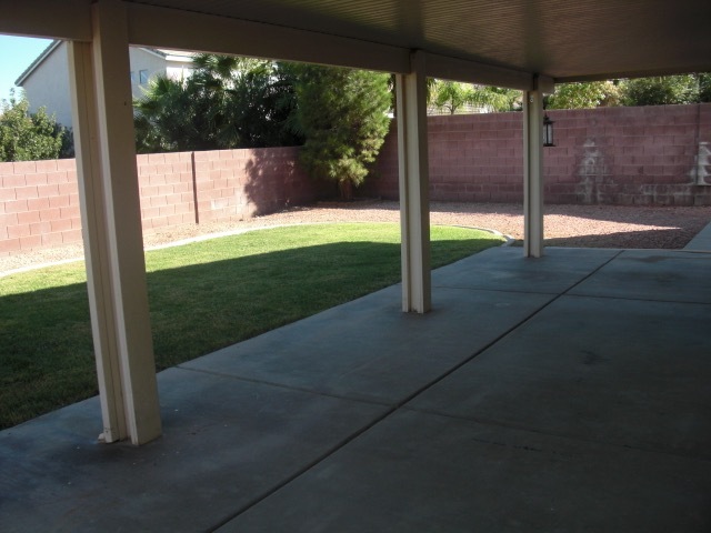 REAR YARD W/COVERED PATIO - 20 Woodcarver St