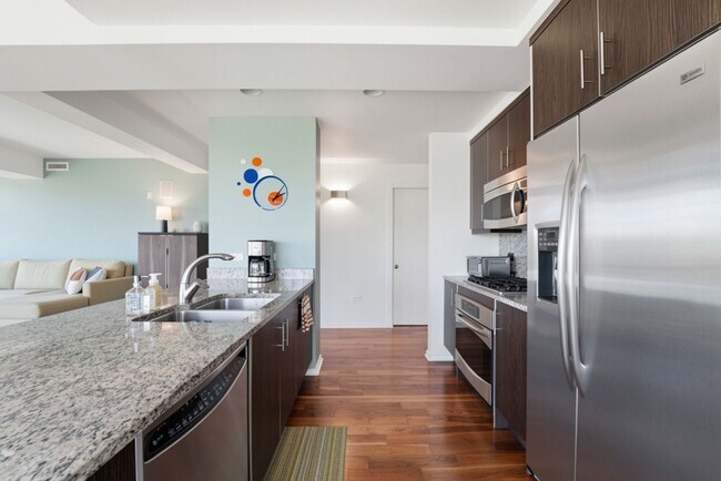 Building Photo - Luxury Corner Unit with Panoramic Mountain Views at Optima Camelview!