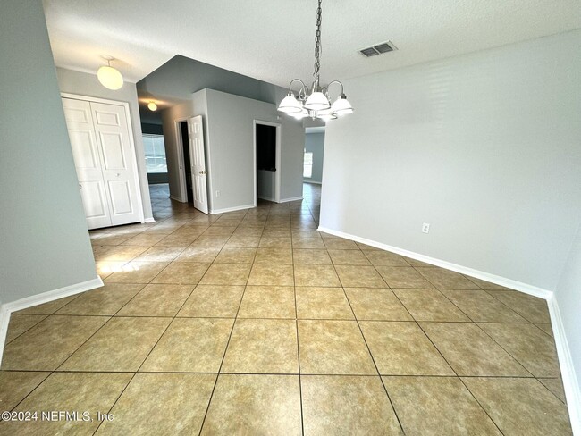 Building Photo - 9237 Caracara Drive