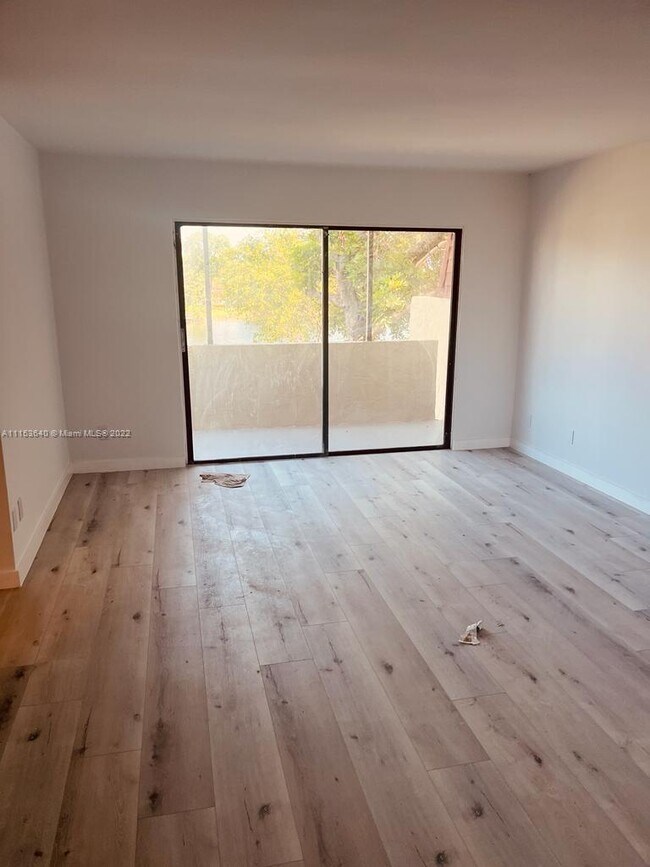 Building Photo - 8950 Palm Tree Ln