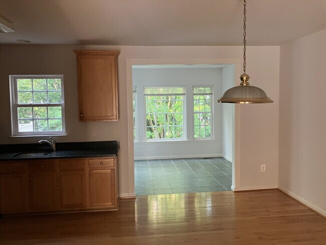Building Photo - Elegant Gated Townhome with Sunroom Extension in Piedmont | 3 Bedrooms | 2 Full & 2 Half Baths