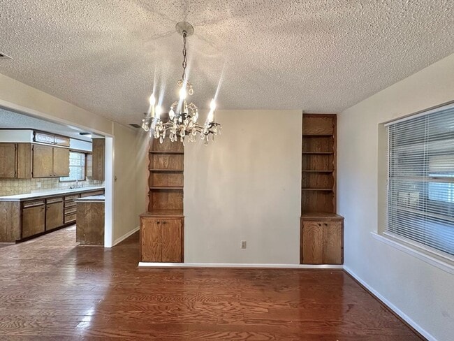 Building Photo - Spacious 4-Bedroom Home on a Corner Lot wi...