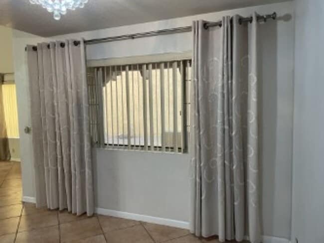 Building Photo - Spacious 3 bedroom, 3 bath, condo with a l...