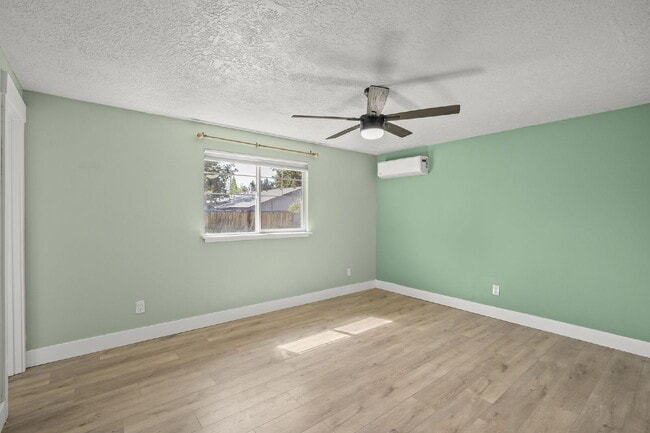 Building Photo - Charming 3-Bedroom Bend Home on 1/2 Acre with Expansive Yard, Mature Trees & Covered RV/Boat Storage