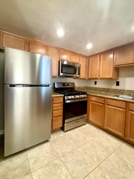 Fridge and stove - 1339 Massachusetts Ave