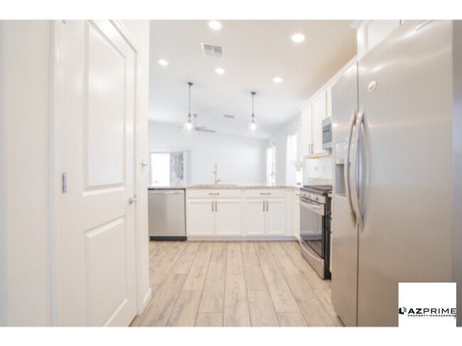 Building Photo - Step Into Unrivaled Comfort And Style With This Like-New 3/2 Phoenix Gem.