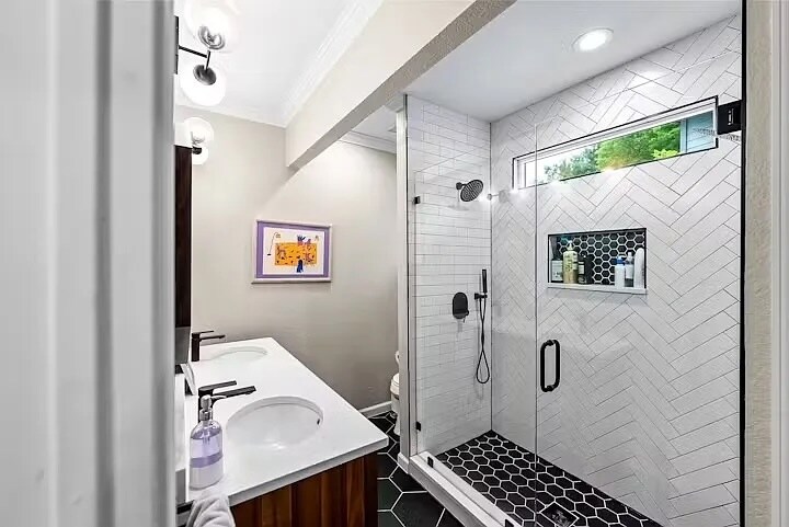 Primary bath with double shower head and double sink - 800 Prospect Ave