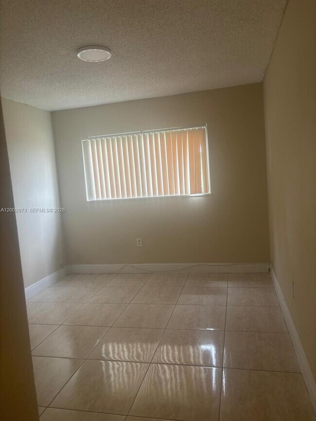 Building Photo - 6950 W 6th Ave