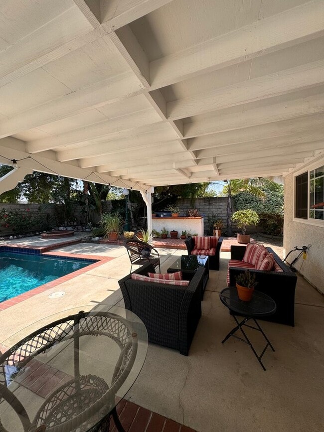 Building Photo - BEAUTIFULLY Updated Home with Pool+ Modern...