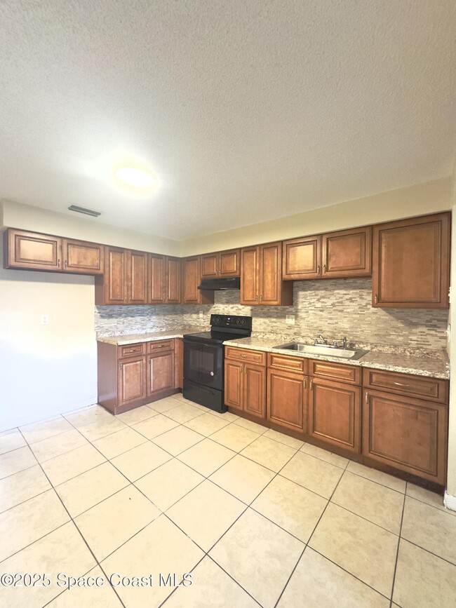 Building Photo - 2466 Uranus Dr