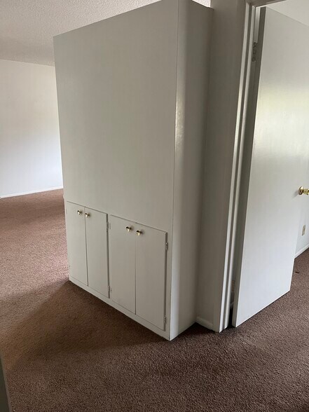 Additional storage. Front is bookcase in living area - 513 28th St