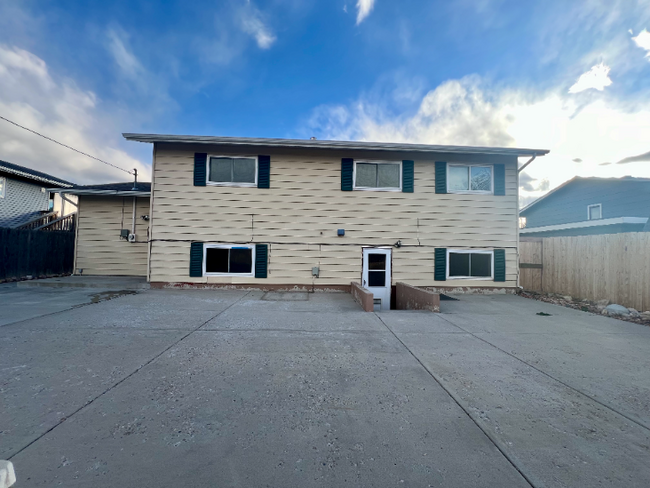 Building Photo - Spacious 4-Bedroom Home with Finished Base...