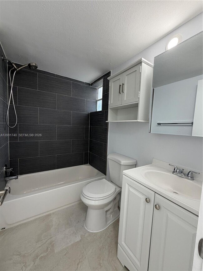 Building Photo - 5990 NE 4th Ct