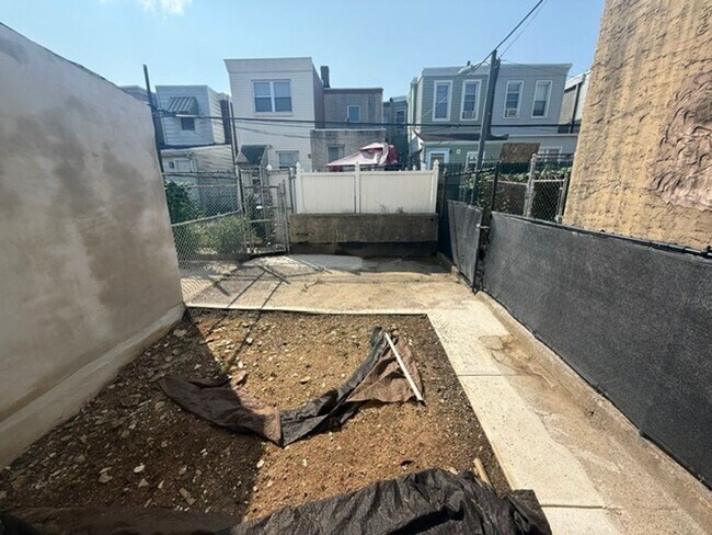 Building Photo - 3-Bedroom Port Richmond Home with Central Air and Expansive Backyard