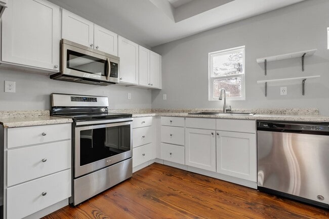 Building Photo - Modern Comfort Meets Prime Location — Styl...