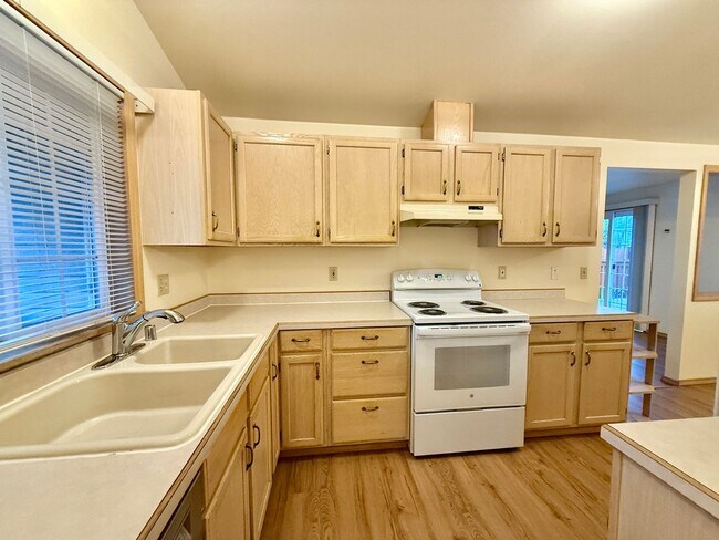 Building Photo - Sunny Rambler on Corner Lot with Large Fenced Yard & Deck