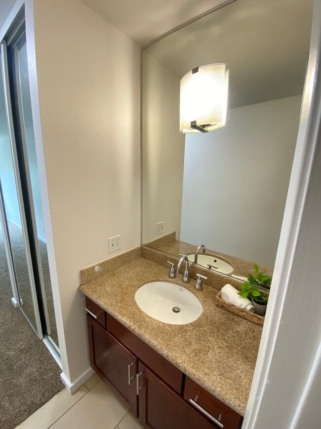 Building Photo - Beautiful Two Bedroom Two Bathroom Condo W/ Balcony & In Unit Laundry!