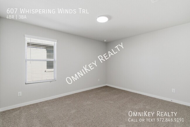 Building Photo - 607 Whispering Winds Trl