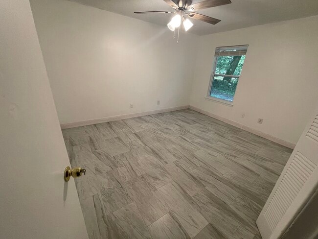 Building Photo - 6831 Tiki Ln