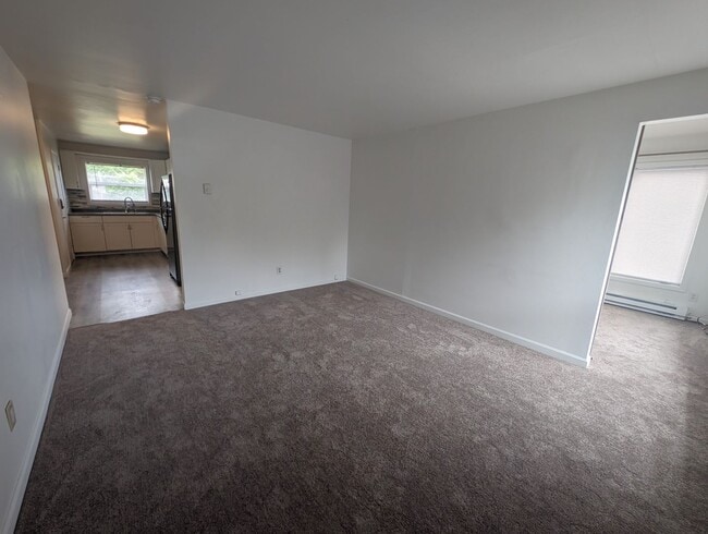 Building Photo - Cute and Cozy, Centrally Located Triplex with Yard