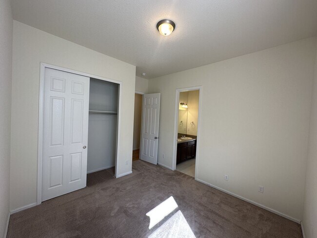Building Photo - Modern 4-Bed Ranch in Erie with 13-Ft Ceil...