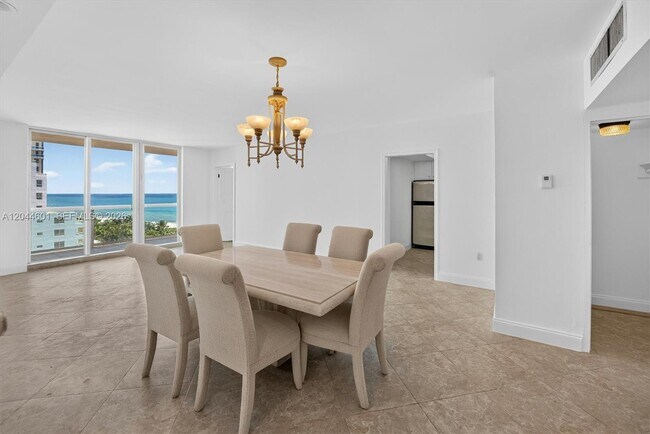 Building Photo - 5001 Collins Ave