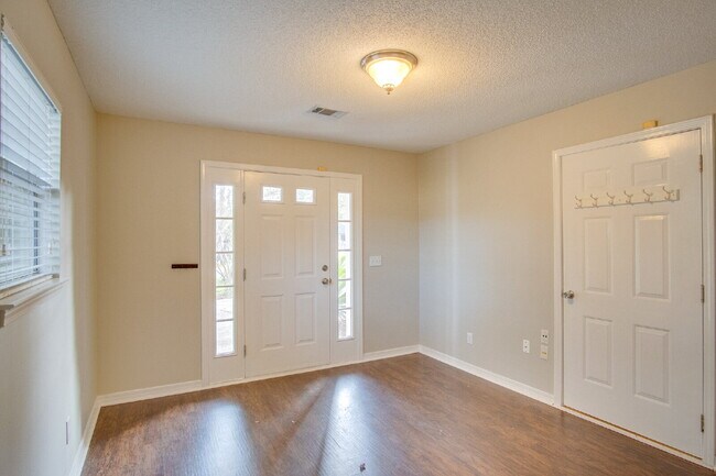 Building Photo - Live the Gulf Breeze Waterfront Life – Dock, Canal Access & Boat Lift!