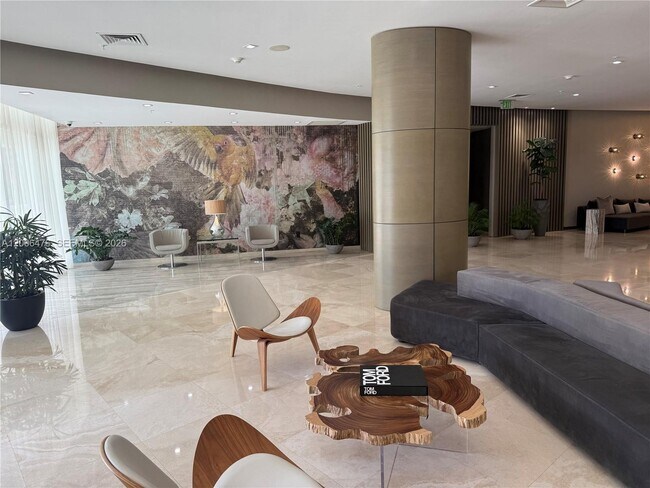 Building Photo - 10275 Collins Ave