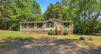 Building Photo - Updated 3-Bedroom Home on 10 acres in Chapel Hill