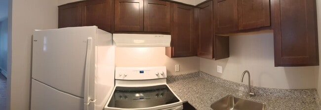 Building Photo - Conveniently located Riverbend Apartments feature a quiet community with a large green space